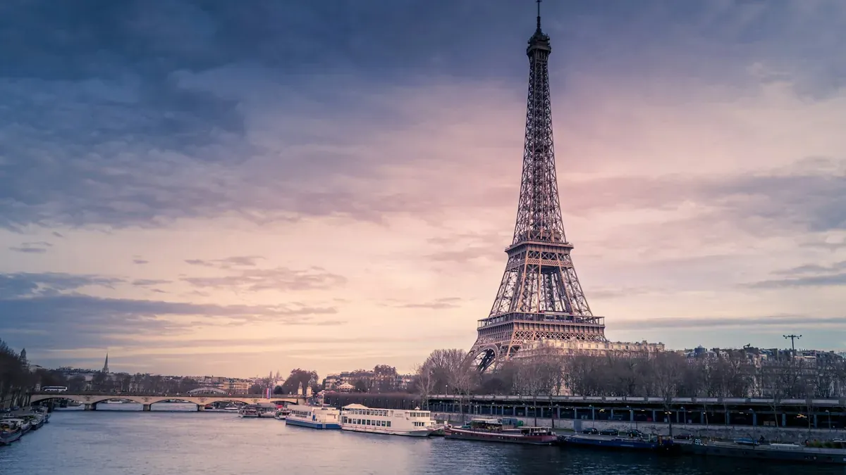 Eiffel Tower above parisian rooftops