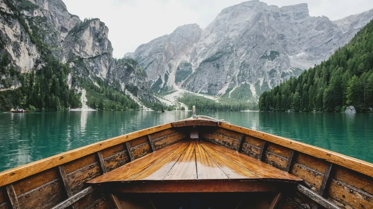 Canoe on a crystal alpine lake