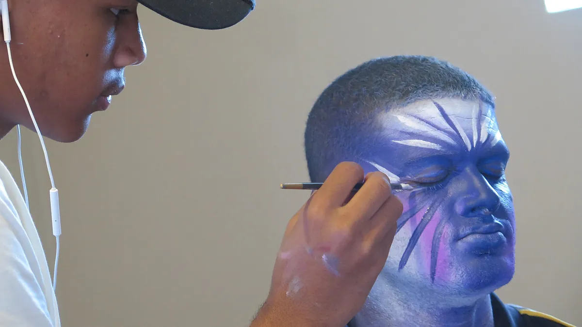 Face painter during the Kaapse Klopse competitions
