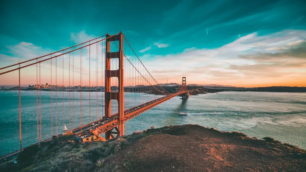 Golden Gate Bridge towers in San Francisco fog